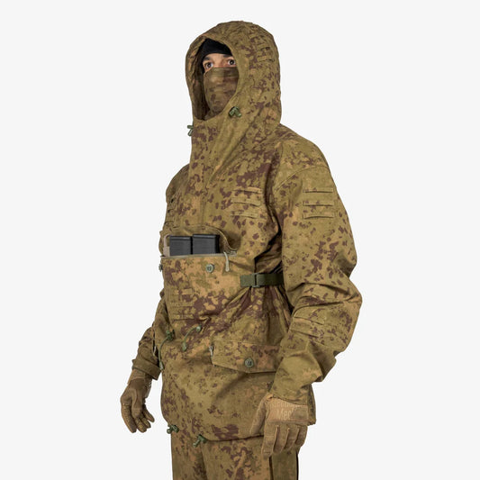 KMCS Field Smock, featuring a camouflage outer layer designed for outdoor concealment and protection.