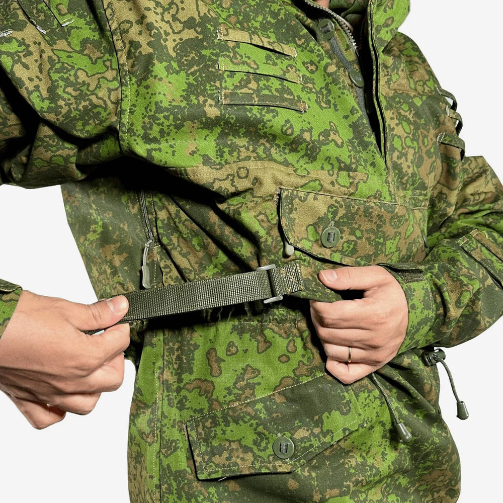 KMCS Field Smock, featuring a camouflage outer layer designed for outdoor concealment and protection.