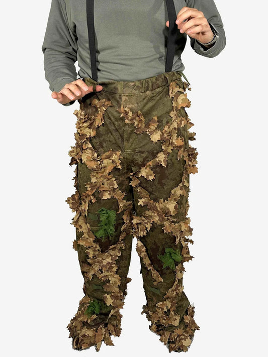 KMCS Ghillie Pants, featuring camouflage material with foliage-style elements designed for outdoor concealment
