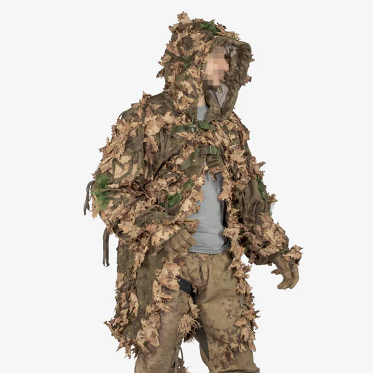 KMCS Cloak, featuring lightweight camouflage material with a natural foliage-inspired pattern for outdoor concealment."