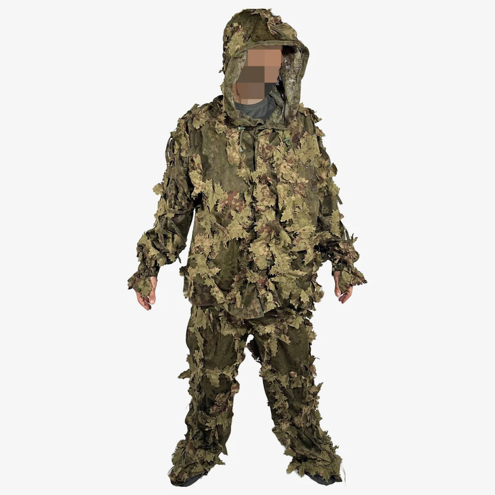 KMCS Ghillie Suit Oakland, featuring green and brown camouflage elements with a leaf-style texture for outdoor concealment.
