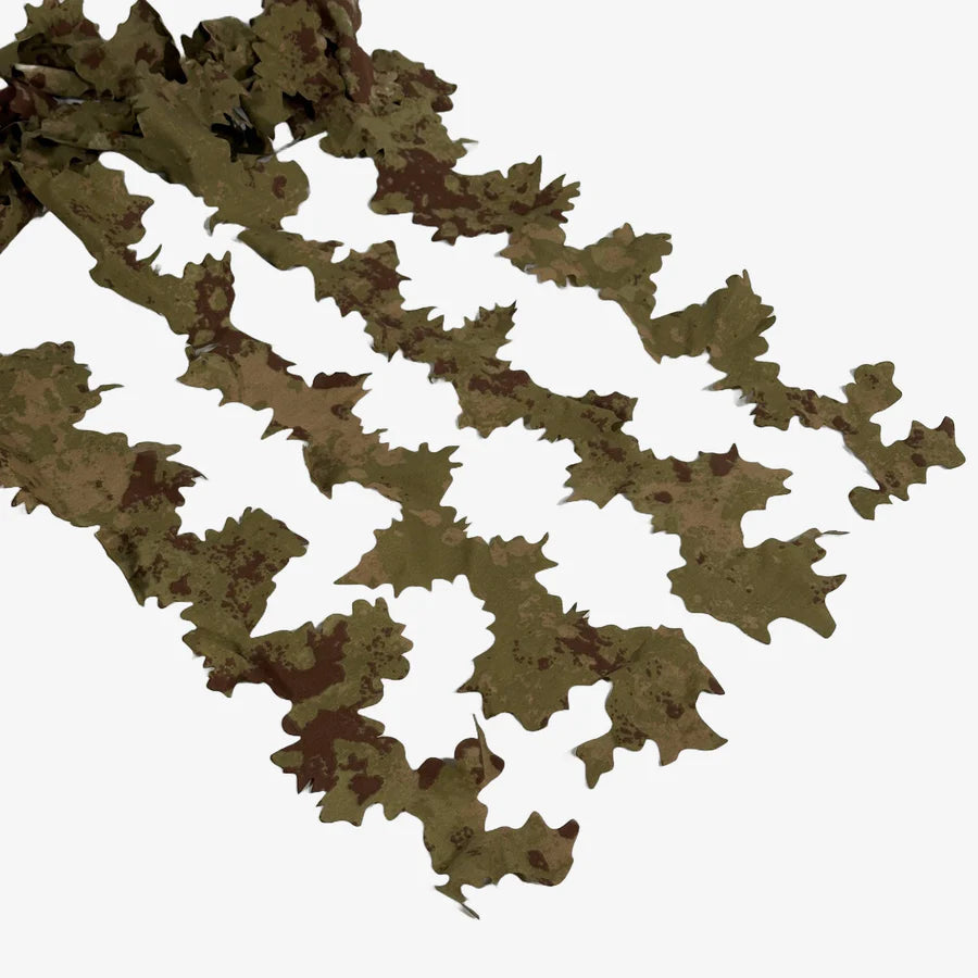 KMCS Adaptive Leaf Strips, featuring camouflage leaf-style strips designed for enhancing natural concealment in outdoor environments