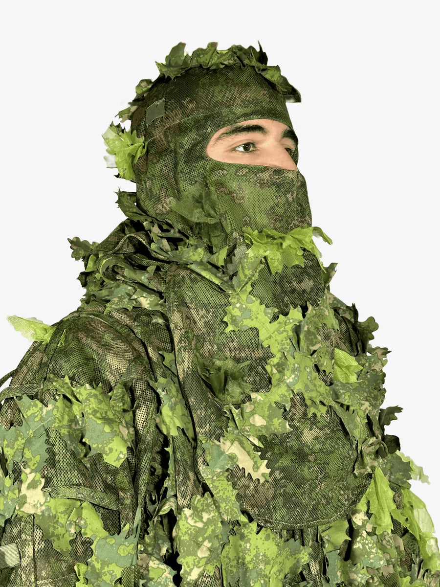 KMCS Balaclava, featuring a camouflage face covering designed for outdoor concealment and protection.