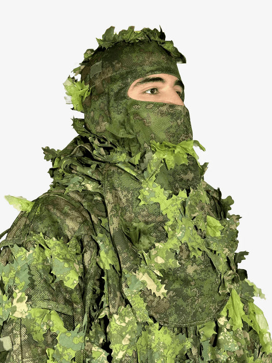 KMCS Balaclava, featuring a camouflage face covering designed for outdoor concealment and protection.