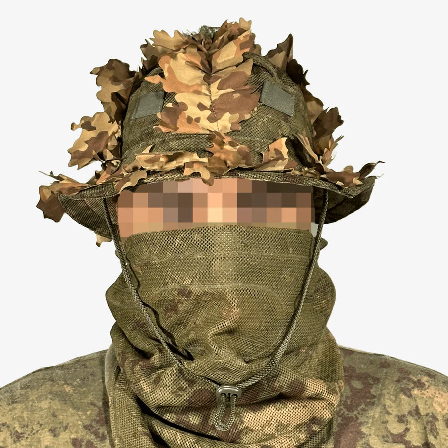 KMCS Boonie Hat, featuring a camouflage design with a wide brim for outdoor concealment and protection.