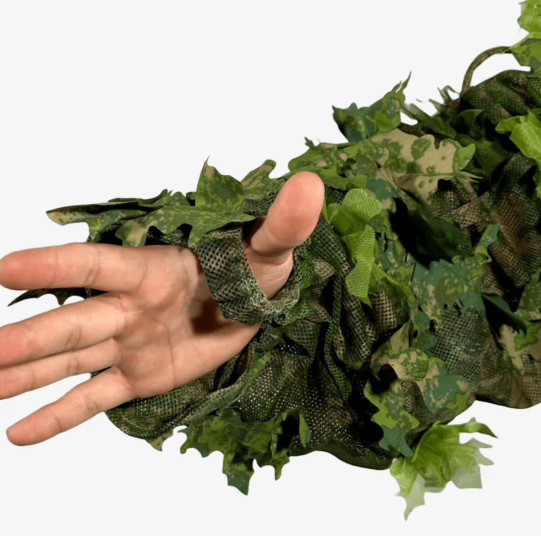 MCS Cloak, featuring lightweight camouflage material with a natural foliage-inspired pattern for outdoor concealment."