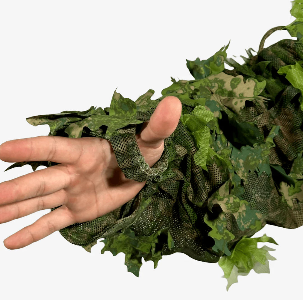 MCS Cloak, featuring lightweight camouflage material with a natural foliage-inspired pattern for outdoor concealment."