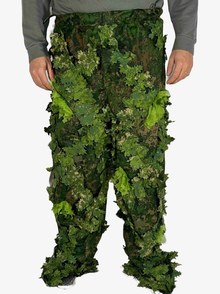 KMCS Ghillie Suit Green, featuring green camouflage elements and a leaf-style texture for outdoor concealment."