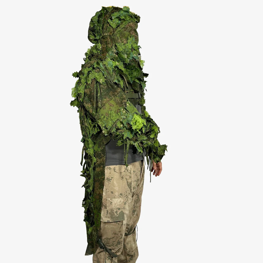 KMCS Python Cloak, featuring a camouflage design with leaf-style elements for outdoor concealment."