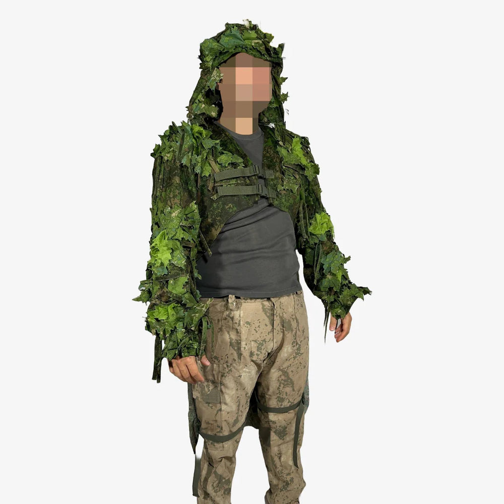 KMCS Python Cloak, featuring a camouflage design with leaf-style elements for outdoor concealment."