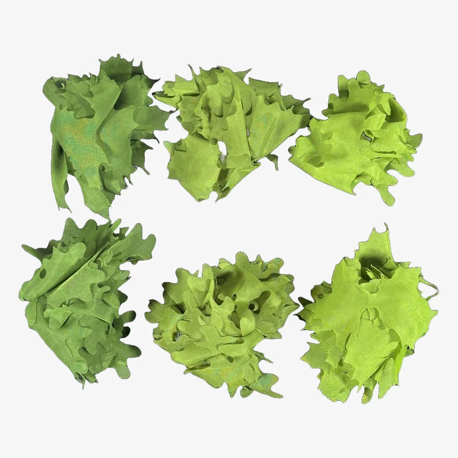 KMCS Tie Leafs, featuring camouflage leaf-style strips designed for attaching to gear and improving outdoor concealment.